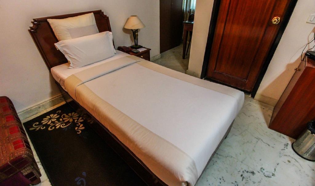 Hotel Pigeon International Bangalore Rom bilde