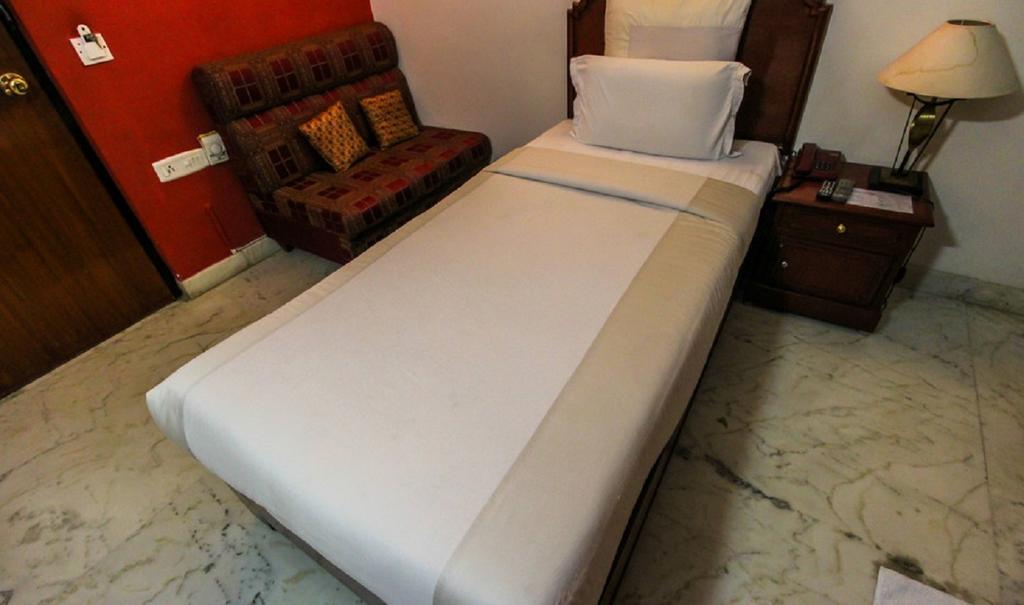 Hotel Pigeon International Bangalore Rom bilde