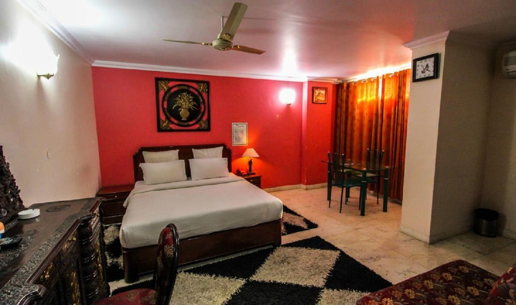 Hotel Pigeon International Bangalore Rom bilde