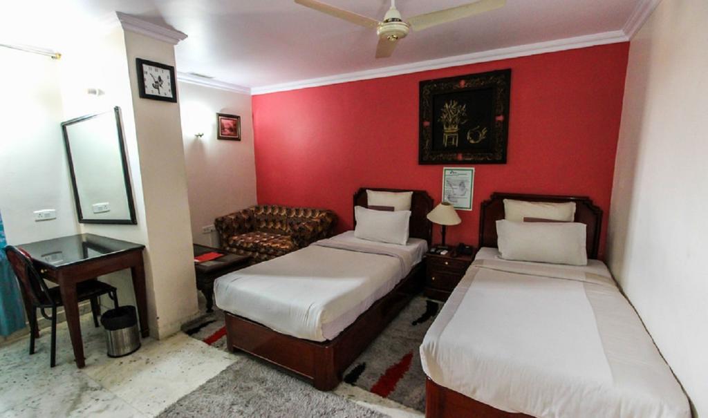 Hotel Pigeon International Bangalore Rom bilde