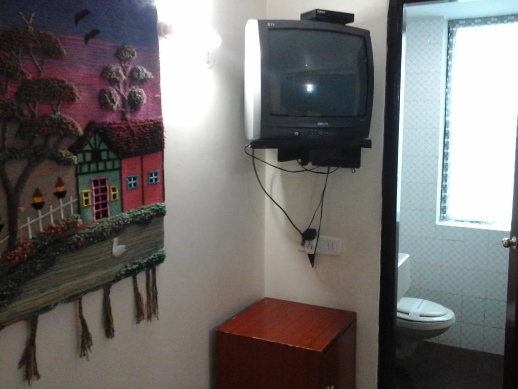 Hotel Pigeon International Bangalore Rom bilde