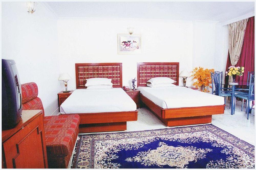 Hotel Pigeon International Bangalore Eksteriør bilde